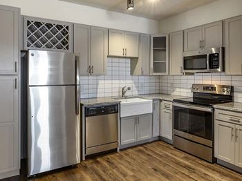 Designer inspired kitchens with farmhouse sinks and granite countertops